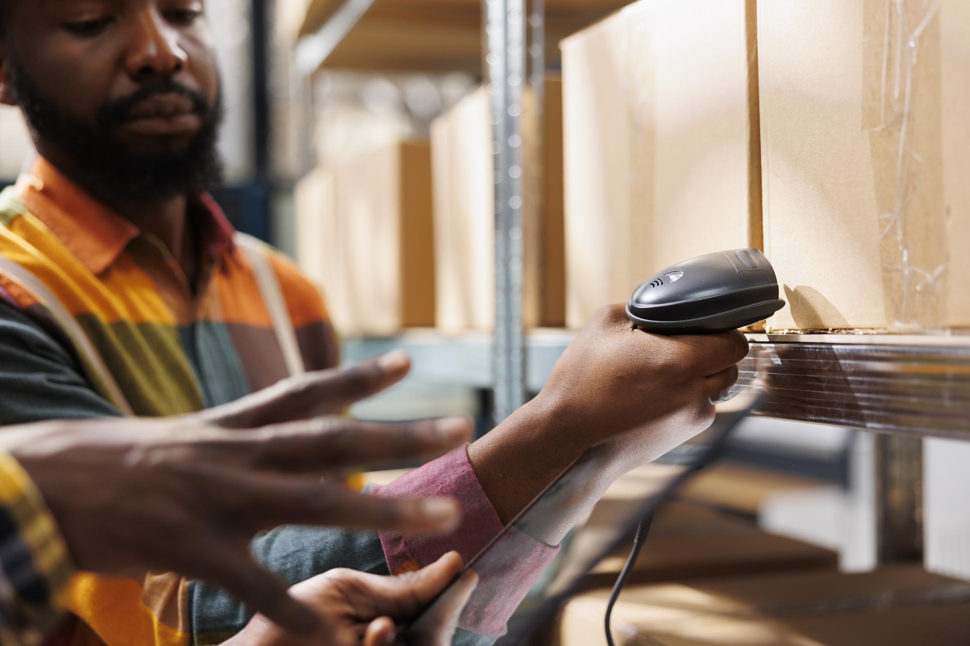 delivery-service-employees-checking-box-qr-code-warehouse